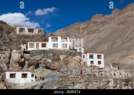 Buddhist monks and part of Phugtal Gompa (also known as Phuktal Gompa), Zanskar, Jammu and Kashmir, India Stock Photo