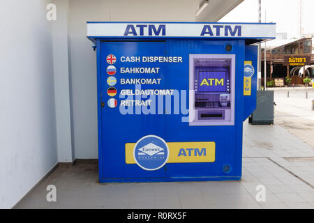 ATM machine with multilingual instructions, Agia Napa, Cyprus October 2018 Stock Photo