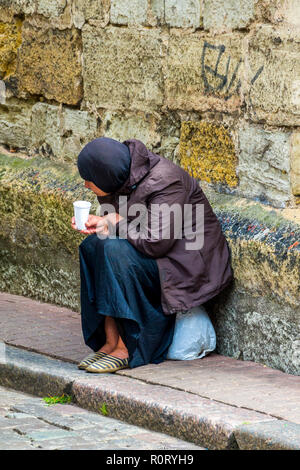 Female Street beggar in Riga Latvia Stock Photo