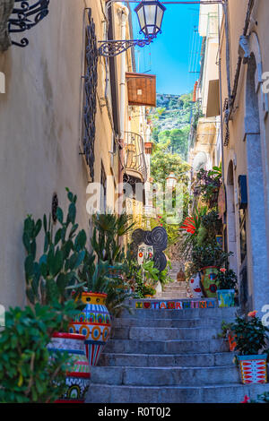 Taormina, Italy - September 26, 2018: The street view of the famous tourist old town Taormina in Sicily. Italy. Stock Photo