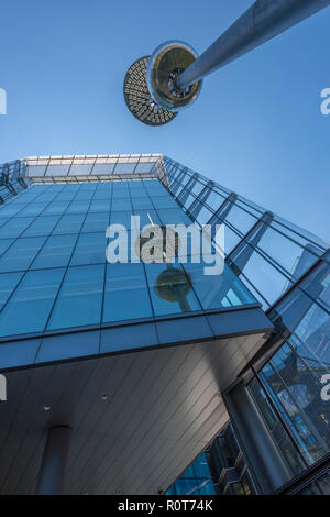 unusual and abstract architecture at more London place in central London. glass fronted contemporary office buildings in central London. Stock Photo
