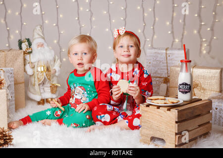 Brother and sister drinking milk Stock Photo - Alamy