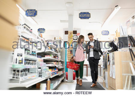 Couple shopping in art supply shop
