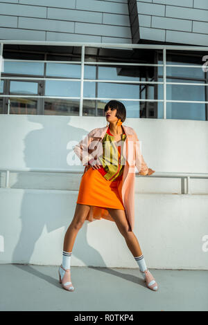Young appealing lady feeling confident while photoshoot Stock Photo