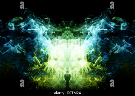 Fluffy Puffs  blue, yellow and green smoke and Fog in the form of a skull, monster, dragon  on Black Background. Fantasy print for clothes: t-shirts,  Stock Photo