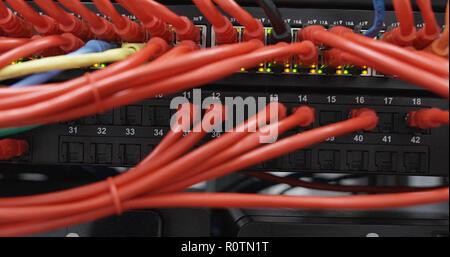 fiber optic with servers in a technology server room Stock Photo