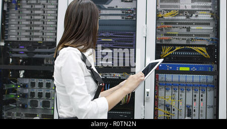 Female administrator at server room Stock Photo