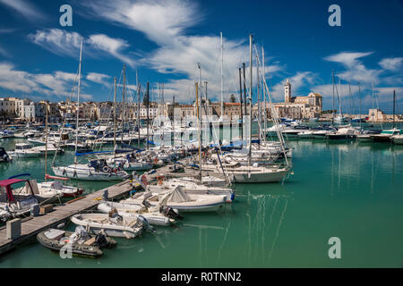 Boats at marina, historic center in distance, Trani, Apulia, Italy Stock Photo