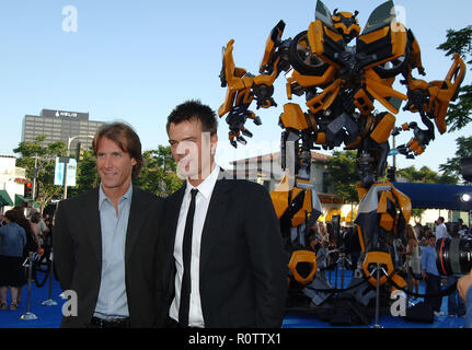 Josh Duhamel and the director Michael Bay arriving at the TRANSFORMERS Premiere at the Westwood Village Theatre in Los Angeles.  horizontale           Stock Photo