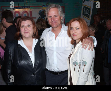 Gillian Anderson posing Chris Carter and Gail Berman (president of entert. FOX Broadcastting Co) at the Series Final Wrap Party for ' X-Files'. The pa Stock Photo