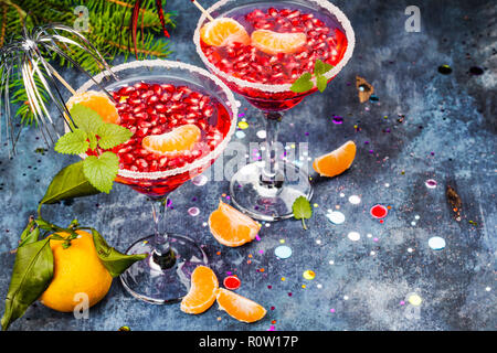 Pomegranage and tangerine martini Stock Photo