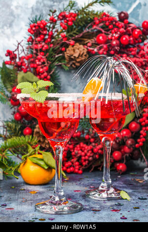 Pomegranage and tangerine martini Stock Photo