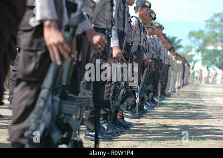 Banda Aceh, Indonesia - August 16, 2005: Indonesia Police with Indonesian Flag at Indonesian Independence day celebration at Blangpadang, banda aceh Stock Photo