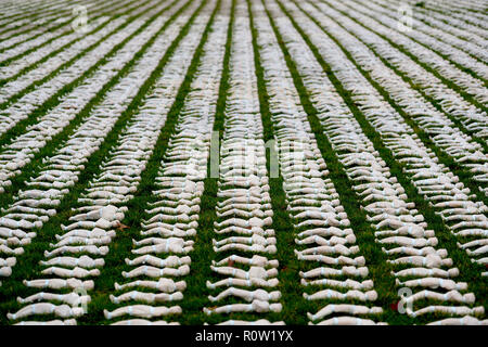 Artist Rob Heard unveils his Shrouds of the Somme installation, honouring the dead of the First World War, at the Queen Elizabeth Olympic Park in London. Stock Photo