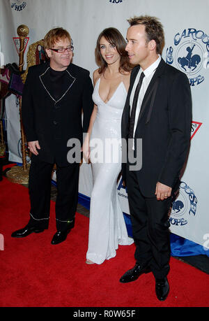 Elizabeth Hurley, Elton John arriving at the Carousel of Hope which support the Barbara Davis Center for Childhood Diabetesat the Beverly Hilton in Lo Stock Photo