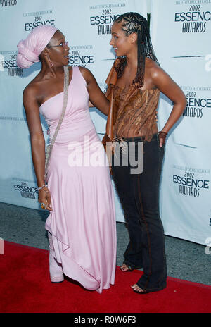Indie Arie and Alicia Keys arrives at the 15th  Anniversary Essence Awards at the Universal Amphitheatre in Los Angeles. May 31, 2002.           -     Stock Photo