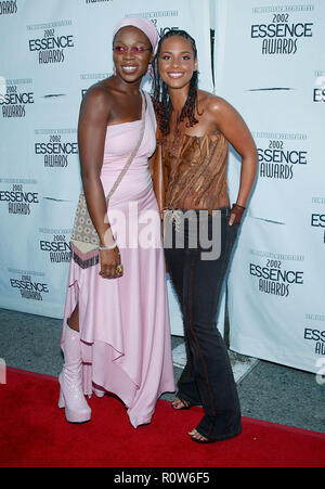 Indie Arie and Alicia Keys arrives at the 15th  Anniversary Essence Awards at the Universal Amphitheatre in Los Angeles. May 31, 2002.           -     Stock Photo