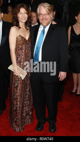 Catherine Keener and Philip Seymour Hoffman arriving at the 12th Annual Screen Actors Guild Awards at the Shrine Auditorium In Los Angeles, Sunday Jan Stock Photo