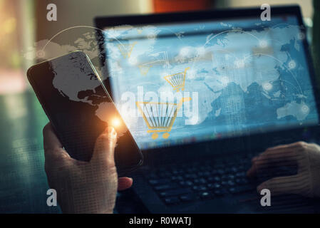 Business people hand using internet on mobile and laptop connect to people online with world map and connection icons on screen. Technology and busine Stock Photo