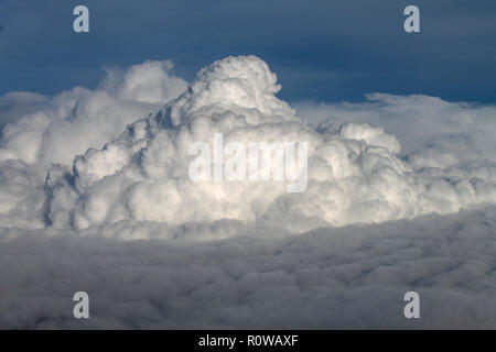 Beautiful cloudscape high up in the sky which look like soft clouds or cotton candy. Stock Photo