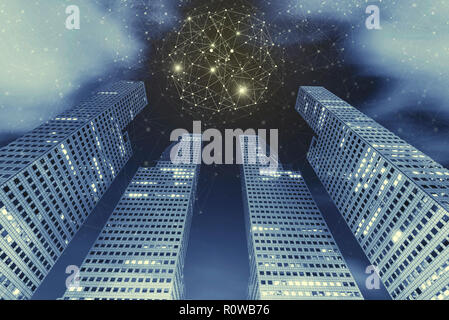 Connection technology background concept. High modern building in city at night with connection icons in the sky with cloud. Communication. Picture fo Stock Photo