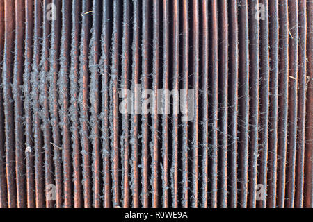 Changing an air filter . Detail, Dirty, clogged air filter surface . General auto maintenance concept Stock Photo