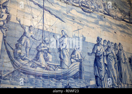 Azulejo tiles depicting scene from the bible on interior wall of the Igreja de Sao Pedro de Palmela Stock Photo