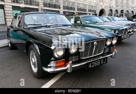 Three-quarter front view of a 1970,  Black Jaguar XJ on display at the  Regents Street Motor Show 2018 Stock Photo