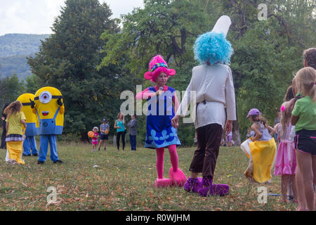 Kamennomostsky, Russia - September 1, 2018: Holiday day of the village with animators and children's playgrounds and competitions in the park in the f Stock Photo