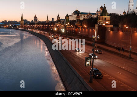 MOSCOW, RUSSIA - JANUARY, 4, 2008: Evening view on the Kremlin Embankment, frozen Moskva River and the cityscape. Stock Photo