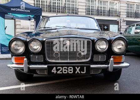 Front view of a 1970,  Black Jaguar XJ on display at the  Regents Street Motor Show 2018 Stock Photo