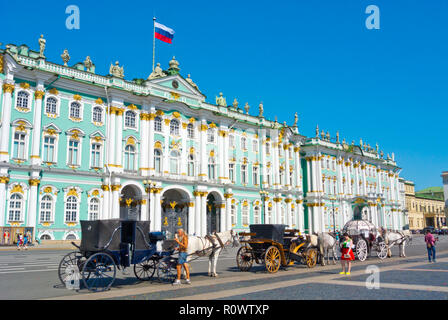 Horse drawn carriages, in front of Winter Palace, Palace Square, Saint Petersburg, Russia Stock Photo