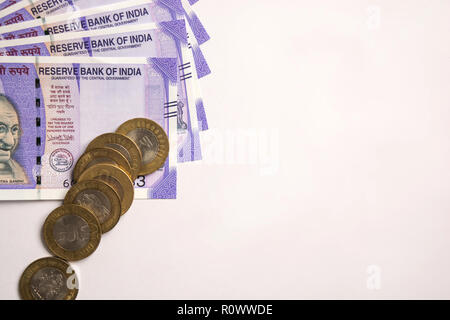 All new 100 Rupees Indian Currencies on isolated background. Stock Photo