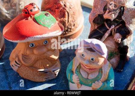 Traditional Russian clay figurines sold on market Stock Photo