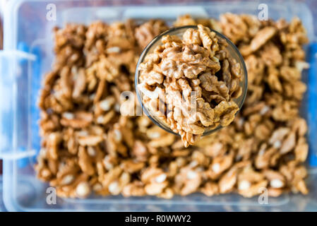 Raw peeled walnut kernels for sale in market Stock Photo