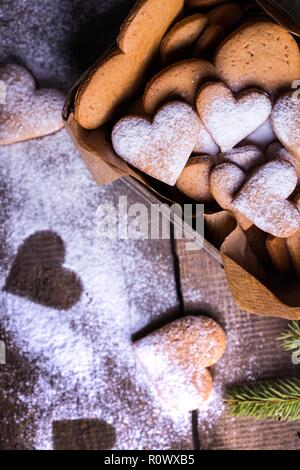 homemade cakes for Valentine's Day - ginger cookies in the form of hearts in the retro box Stock Photo