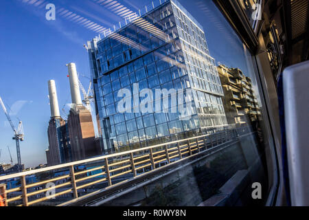 Battersea Power Station and new flats as seen from train, London, UK Stock Photo