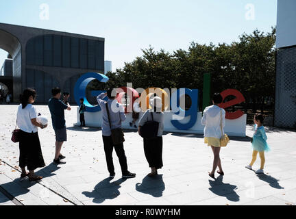 SINGAPORE, March 2018: Google logo on campus being photographed Stock Photo