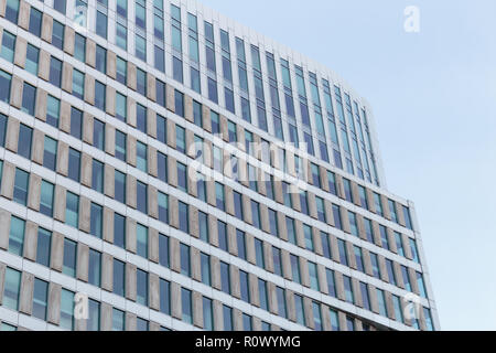 Modern office building against clear blue sky Stock Photo