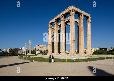 Athens. Greece. The Temple of Olympian Zeus (Olympieion) and the Acropolis in the background. Stock Photo