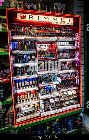 A selection of Rimmel beauty products on sale at the local chemist including lipstick, eyeliner and much more Stock Photo