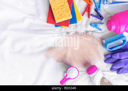 Stains on clothing and laundry detergent and cleaning. Stock Photo