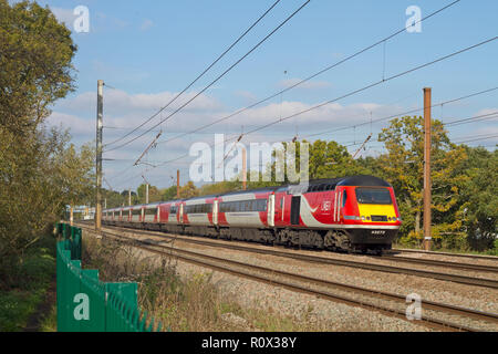 An LNER HST with power cars 43272 and 43306 heads south along the East Coast Mainline at Brookmans Park. Stock Photo