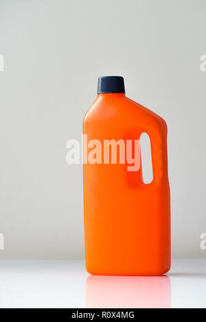 Orange plastic bottle for chemicals with copy space Stock Photo