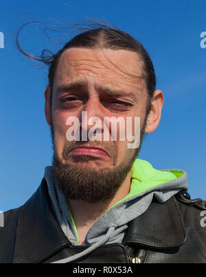 Crying adult man, emotional portrait. Stock Photo