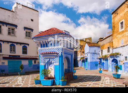 Public fountain of the Plaza El Hauta, square in medina of Chefchaouen Morocco Stock Photo