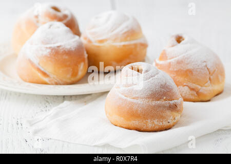 Freshly baked cinnamon buns with spices Stock Photo
