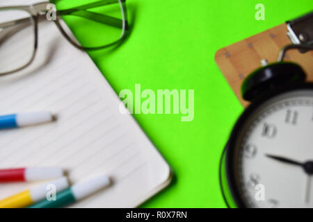 blurred notebook in bokeh background with motivation and education concepts Stock Photo