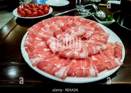 Hotpot beef rolls closeup on plate Stock Photo