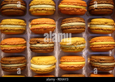 Colorful french macarons background close up Stock Photo